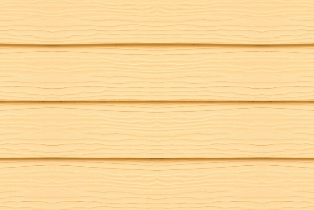 Detailed close-up of textured yellow wooden panels, ideal for design projects.